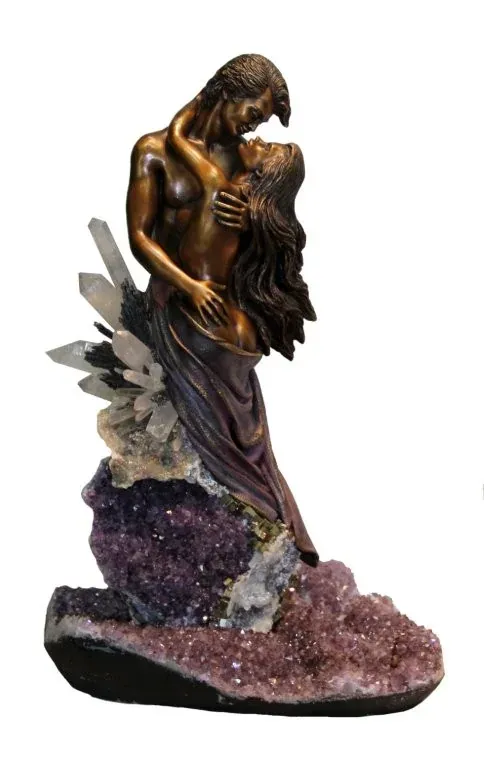 Bronze embracing figures on an amethyst geode